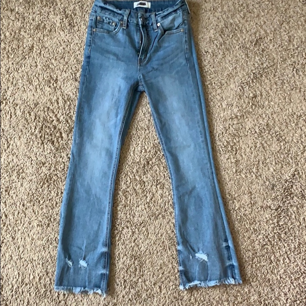 Distressed bootcut capris